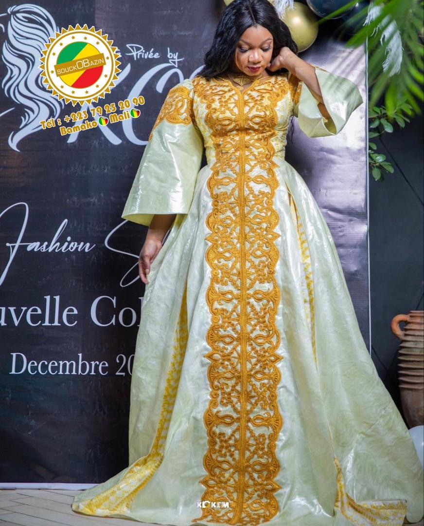 Bazin ivoire — broderie dorée centrale spectaculaire.